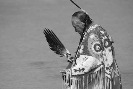 ELDER WITH EAGLE FEATHERS